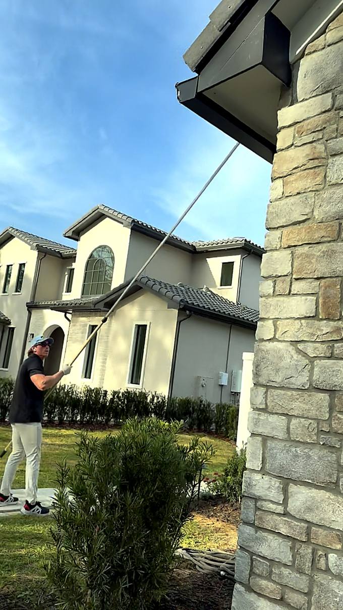 Bugg Me Knot technician treating a coastal home